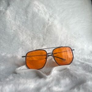 Orange Shades with black frame.